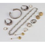 A silver bracelet and minor silver jewellery, 122 grams