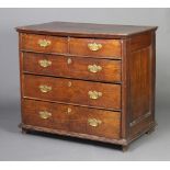 A 17th/18th Century oak chest of 2 short and 3 long drawers 84cm h x 58cm There is a split to the