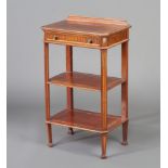 An Edwardian inlaid mahogany 3 tier etagere with raised back, fitted a frieze drawer and raised on