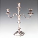 A silver 3 light candelabrum, rubbed marks, gross 23 ozs