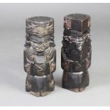 A pair of Chinese carved hardwood figures of standing warriors 48cm x 16cm x 13cm, the base with