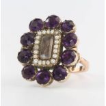 A yellow gold amethyst and seed pearl memoriam ring (ex brooch) size O