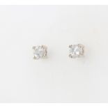 A pair of 18ct white gold single stone diamond ear studs approx. 0.3ct,