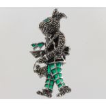 A silver enamel, marcasite and emerald set brooch in the form of a rabbit waiter