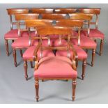 A set of 10 Georgian style mahogany bar back dining chairs with carved mid rails and over stuffed