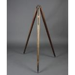 A 19th/20th Century gilt metal and wooden tripod, the strutt marked 105158 Francis W.Troup, 150cm h