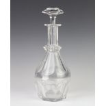 An Edwardian mallet shaped decanter and stopper 31cm