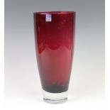 A Dartington Crystal cranberry glass vase 28cm