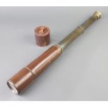 Broadhurst, Clarkson and Company, 63 Farringdon Road, London, a leather and brass 4 draw telescope