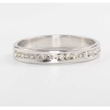 An 18ct white gold diamond half eternity ring size M