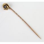 An Edwardian gold tie pin