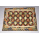 A brown, green and black ground Maimana Kilim with 2 row border 204cm x 158cm