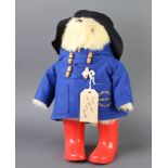 A Top BearLtd Paddington Bear, boxed and with original carrier bag