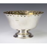 A stylish silver pedestal punch bowl with gilt interior on spread foot, Sheffield 1995, 29cm, 1255