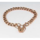 A 9ct rose gold heart link bracelet with padlock 10.8 grams