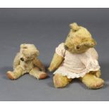 A yellow bear with articulated limbs 32cm (some wear to the body) and 1 other 50cm