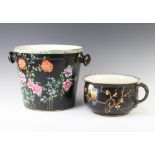 A 1930's chamber pot the black ground decorated with a moonlit scene with owl and peony together
