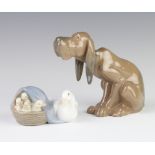 A Lladro figure of a seated hound "Rex" 14cm, a ditto group of a goose and goslings 4895 10cm