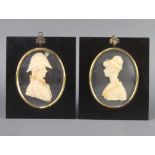 Lesley Ray, a pair of wax silhouettes of an 18th Century lady and gentleman, ovals, 12cm x 9.5cm