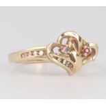 A 10ct yellow gold gem set heart ring, size N 1/2