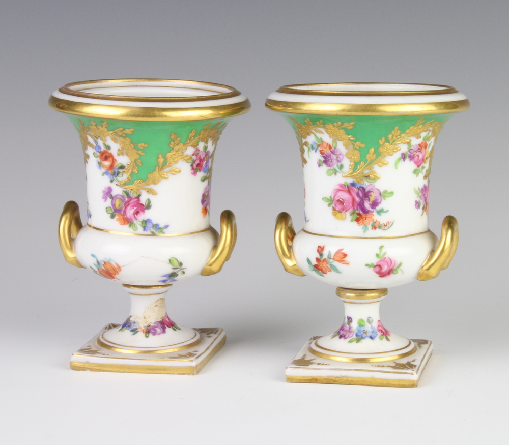 A pair of Dresden style 2 handled vases decorated with spring flowers 12cm 1 is stuck and cracked