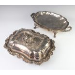 A Victorian silver plated entree dish and cover with chased monogram together with a base