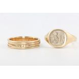 A gentleman's 9ct yellow gold wedding band, size V and a signet ring size X, 14.5 grams