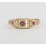 A 9ct yellow gold ruby ring size U, 2.1 grams