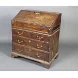 A 17th/18th Century oak bureau with fall front revealing a fitted interior, above 2 short and 2 long