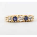 An 18ct yellow gold sapphire and diamond half hoop ring, size Q