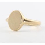 A 9ct yellow gold oval signet ring size K, 3.5 grams