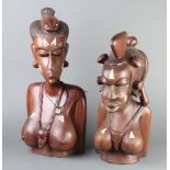 A pair of African hardwood and inlaid bone portrait busts of ladies 49cm h x 24cm w x 16cm d