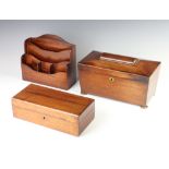 A 19th Century mahogany twin compartment tea caddy of sarcophagus form, the interior fitted an
