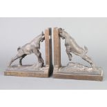 Da Silva, a pair of bronze bookends in the form of goats, the bases marked K189 and K190, 17cm h x