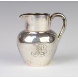 A Russian silver baluster jug of plain form, stamped 84, 124 grams, 8cm