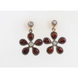 A pair of Edwardian style silver gilt garnet and diamond ear studs