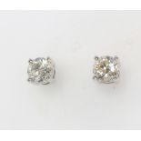 A pair of 18ct white gold single stone diamond ear studs 1.05ct