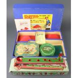 A Bayko Building set together with a tin plate golf game