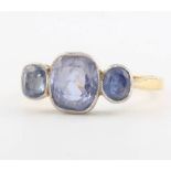 An 18ct yellow gold 3 stone sapphire ring size O
