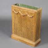 A French gilt painted rectangular single cane bergere umbrella stand with swag decoration and