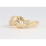 An 18ct yellow gold diamond set ring size Q