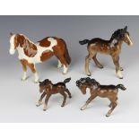 A Beswick figure - Pinto Pony skewbald gloss 16.5cm, a shire foal (large) brown gloss 15.9cm, a foal