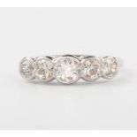 A platinum 5 stone diamond ring approx. 1.4ct, size N