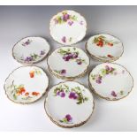 Sixteen Limoges dessert plates decorated with flowers 22cmNine are chipped