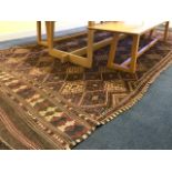 A KILIM DESIGNED FLOOR RUG