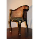 A FRENCH LACQUERED BERGERE CHAIR