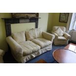 A MODERN CREAM UPHOLSTERED THREE PIECE SUITE, comprising a sofa and pair of armchairs (3)