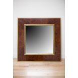 A SQUARE WALNUT AND BRASS WALL MIRROR