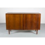 A DANISH ROSEWOOD SIDE CABINET, BY GUNNI OMANN FOR OMANN JUNIOR,