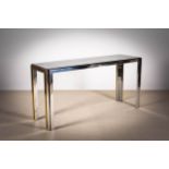 A CHROME AND GILT CONSOLE TABLE, ITALIAN 1960s, with smoked glass inset top,145cm (w) x 45cm (d) x